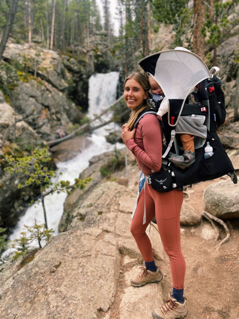 girl and baby on a waterfall hike